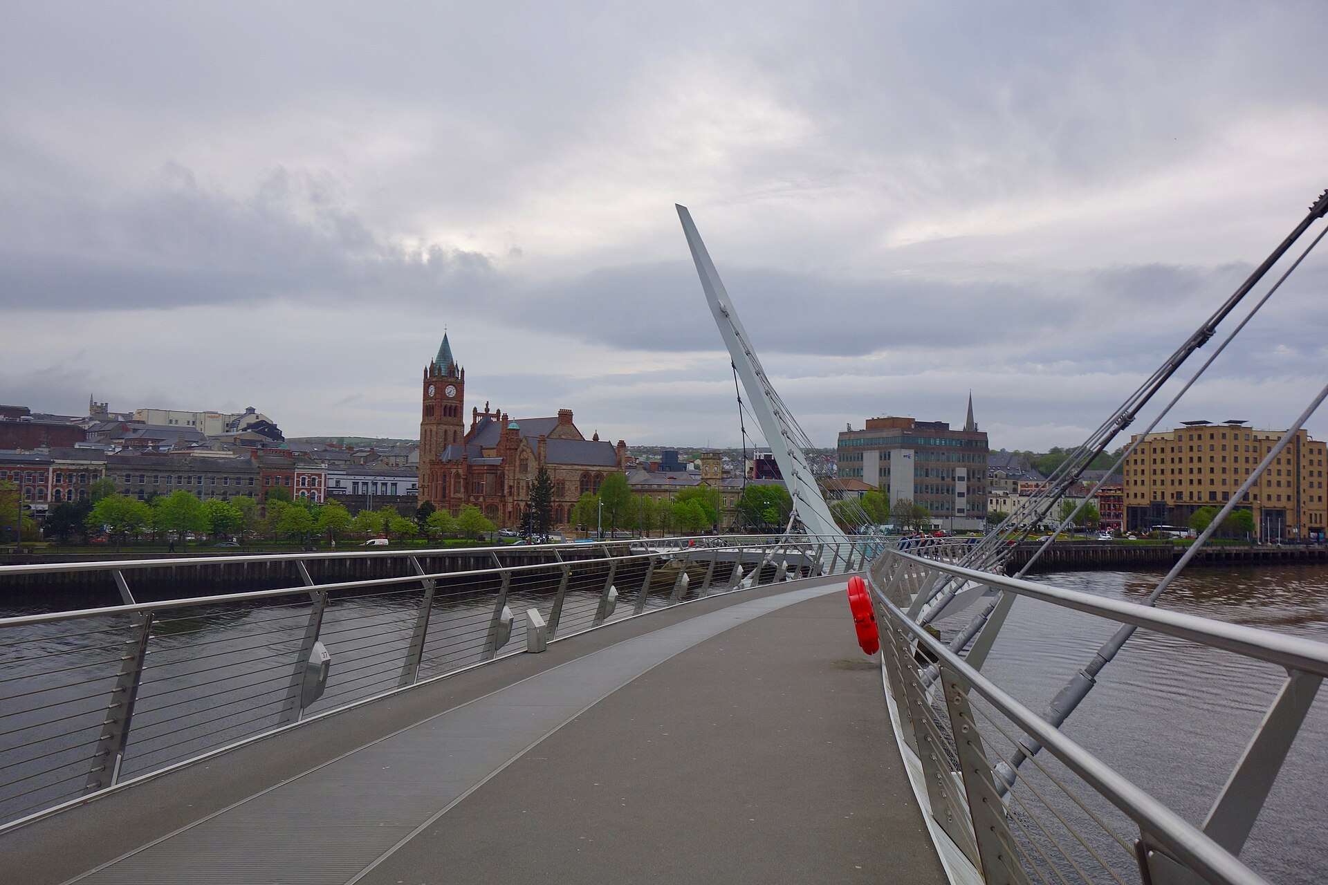 The Peace Bridge over the Foyle, with the Guildhall beyond